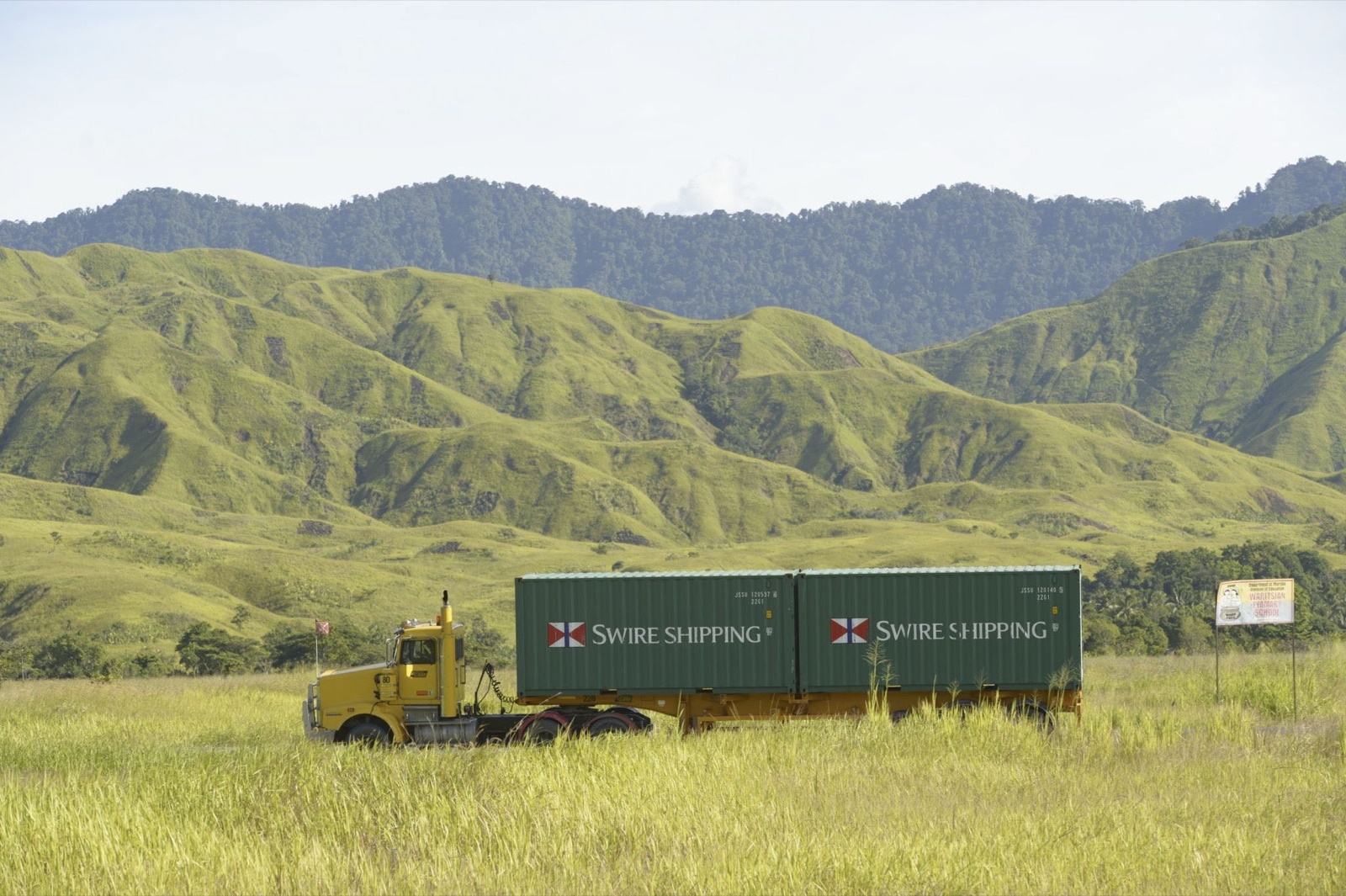 Swire Shipping containers on the road